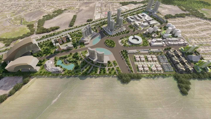 Perspective aerial visualization of planned buildings, roads, and landscaped areas